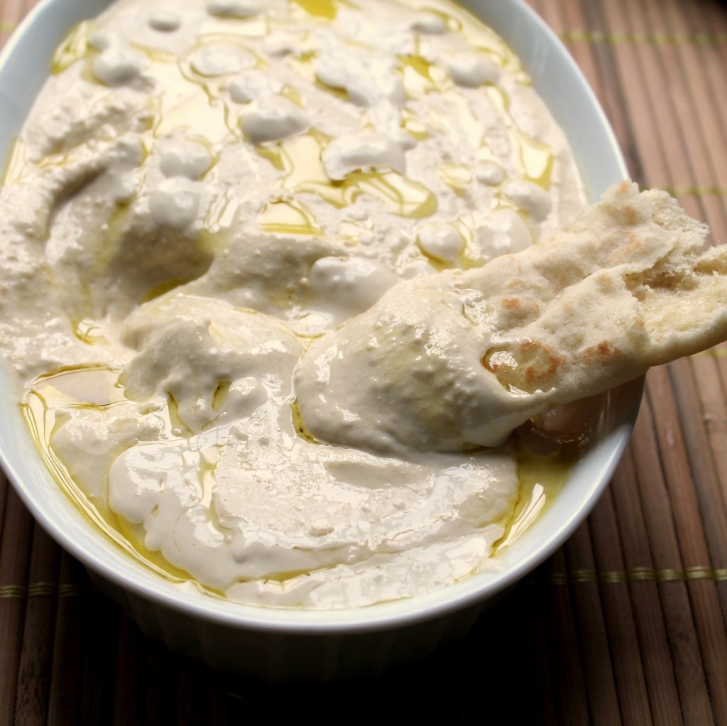 creamy hummus with lemon garlic sauce