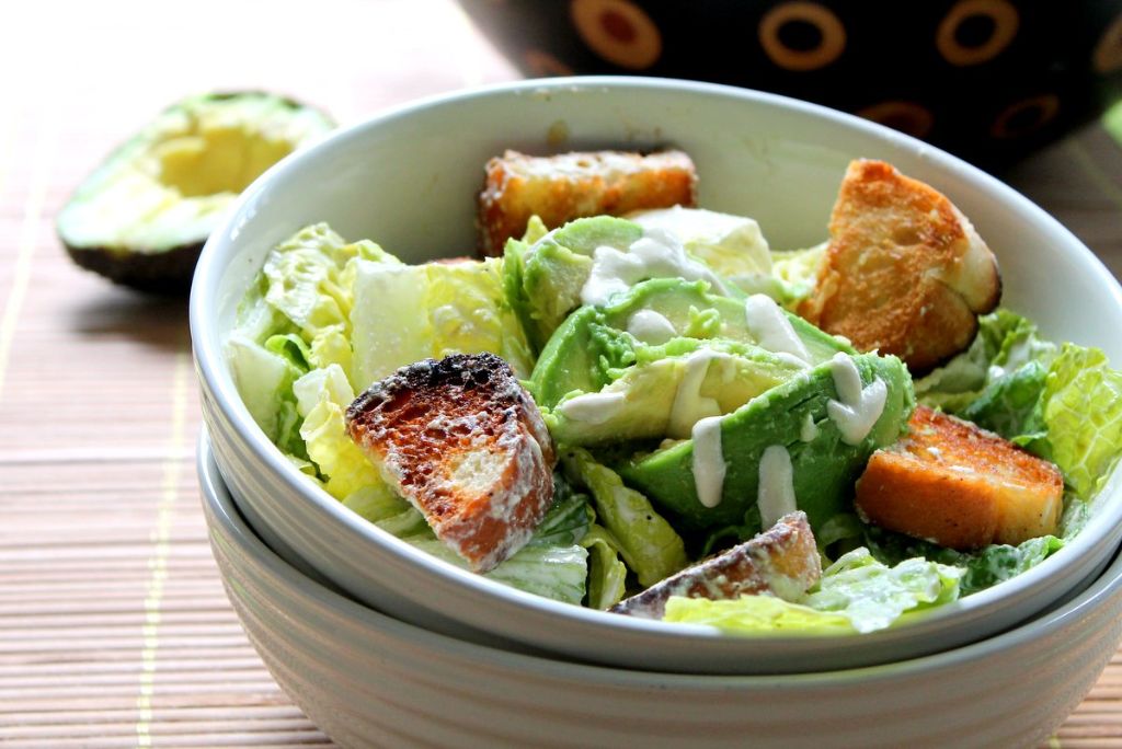 vegan caesar salad with avocado and garlic croutons