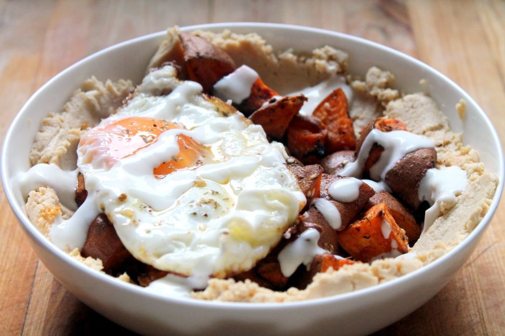 Hummus & sweet potato breakfast bowl. A vegetarian breakfast full of carbs and protein to start the day off right!