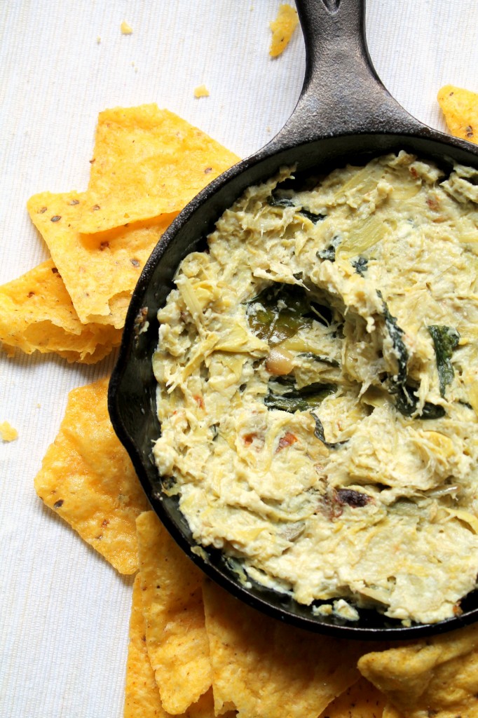A simple and delicious recipe for baked artichoke and feta cheese dip. Only 5 ingredients, no chopping, very little prep, an hour in the oven, and it's done! This is a light and fresh tasting dip which really lets the artichoke and feta tastes come through.