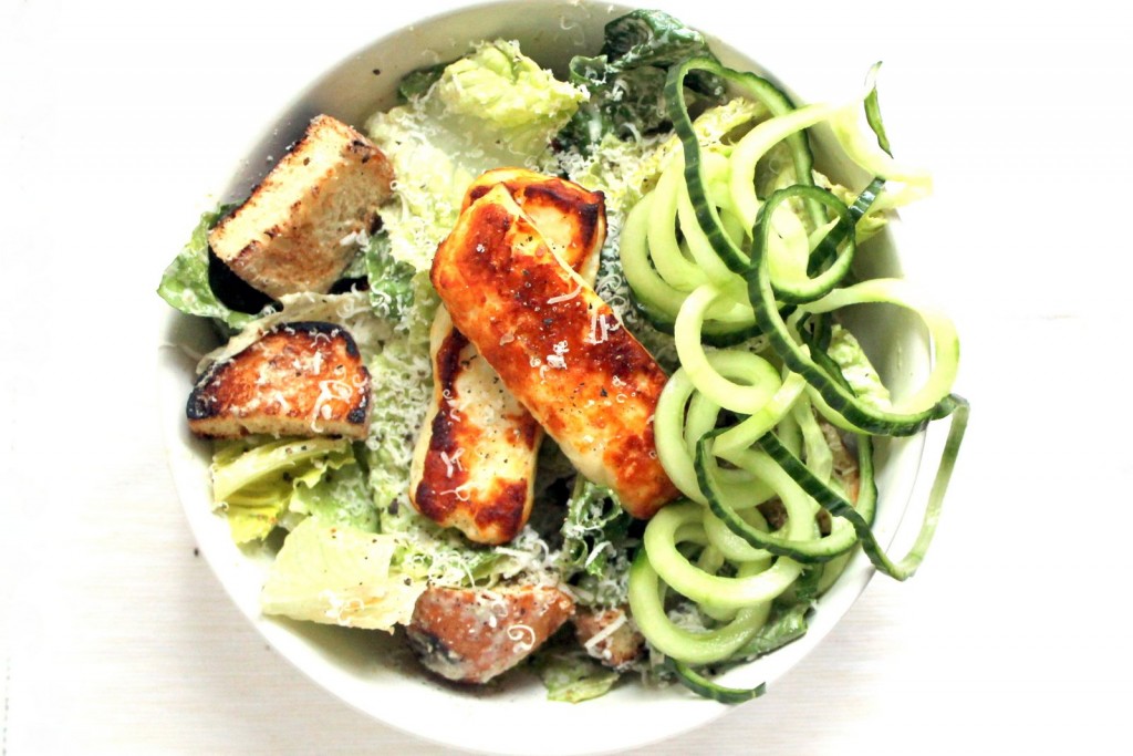 A greek inspired vegetarian caesar salad . Greek yogurt dressing infused with green olives, and halloumi cheese!