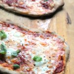 Home made sourdough pizzas! Mini pizzas with a rye sourdough crust and three cheeses. Delicious flavors but so simple. Incredible #vegetarian lunch or snack.