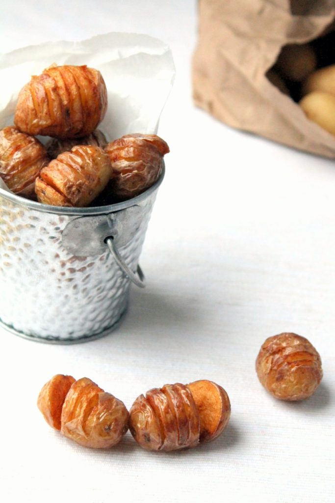 Turn your baby potatoes into mini hasselback fries! These are soft in the middle with lots of crispy bits on the outside. These are such a fun appetizer that everyone will enjoy! Deep fry or roast them - the choice is yours!