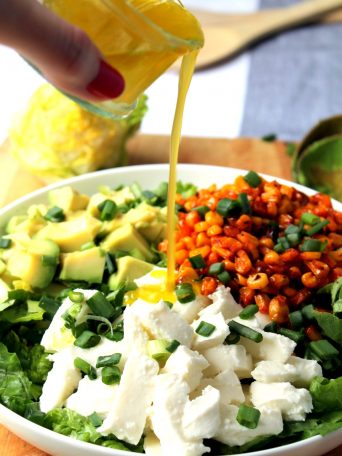 This is a fresh, flavorful vegetarian salad (tastes particularly amazing next to a plate of enchiladas!)