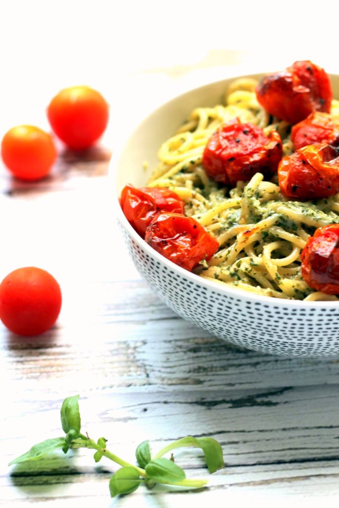 You can't go wrong with a big bowl of pasta with roasted / blistered cherry tomatoes. This recipe uses roasted garlic pesto which is creamy, tasty and naturally vegan. The cherry tomatoes are blistered and intensely flavorful too. You'll be hooked on this simple vegetarian pasta dinner. Best served with a glass of wine!