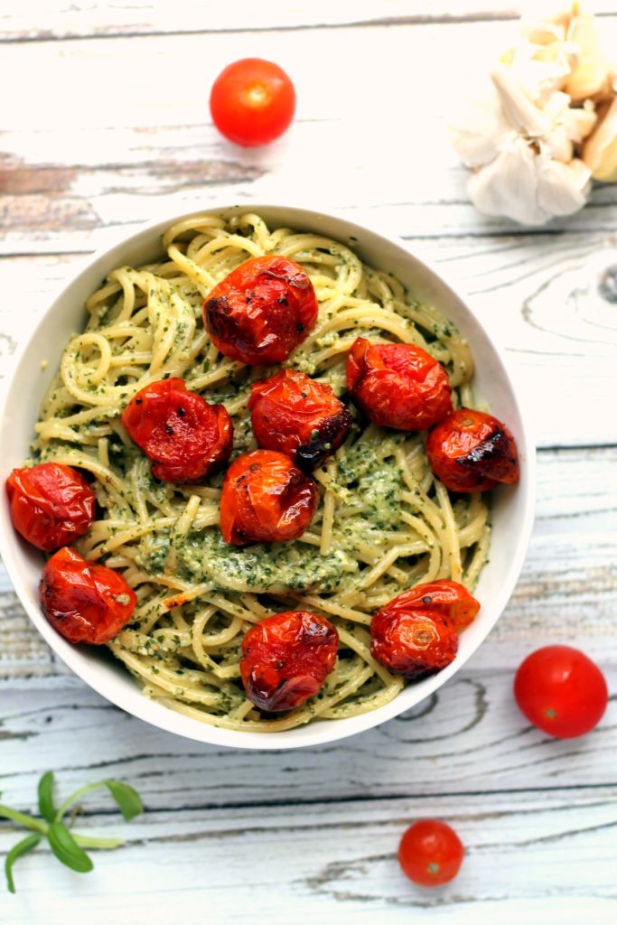 You can't go wrong with a big bowl of pasta with roasted / blistered cherry tomatoes. This recipe uses roasted garlic pesto which is creamy, tasty and naturally vegan. The cherry tomatoes are blistered and intensely flavorful too. You'll be hooked on this simple vegetarian pasta dinner. Best served with a glass of wine!