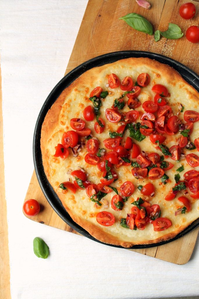 This caprese pizza takes a few simple ingredients and turns them into something amazing. The easy no-yeast buttermilk pizza dough requires no proofing, and turns out deliciously crisp and flavourful. 