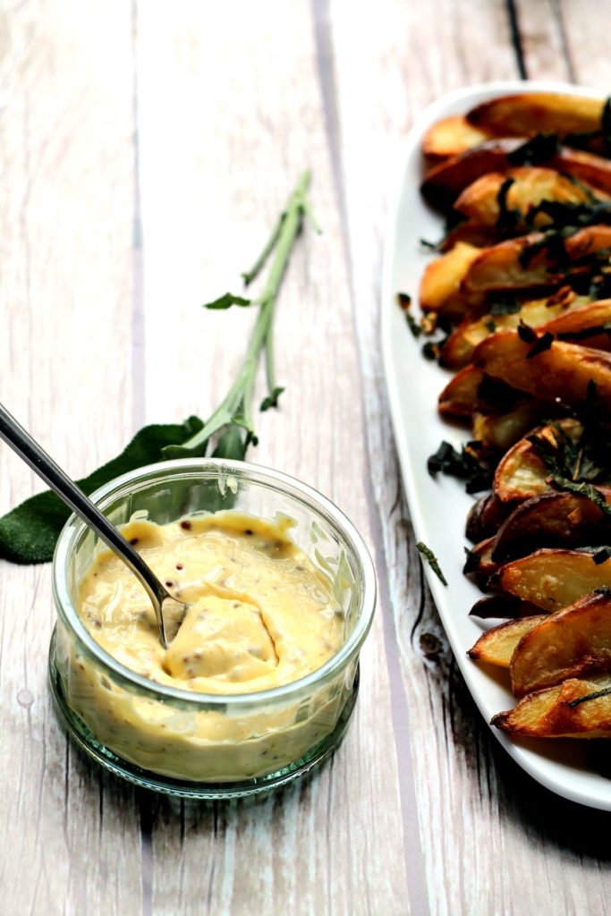 Incredibly tasty oven baked potato wedges served with a home made truffle mayonnaise dip. It tastes fancy but is an easy snack or side dish to make at home, and worth a little extra effort to make your own truffle mayo! Treat yourself!