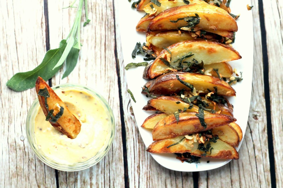 Incredibly tasty oven baked potato wedges served with a home made truffle mayonnaise dip. It tastes fancy but is an easy snack or side dish to make at home, and worth a little extra effort to make your own truffle mayo! Treat yourself!