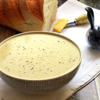 This vegetarian soup is packed with flavor! Only 5 ingredients, easy to make in the slow cooker. This is based on the classic British broccoli and stilton soup, but with a little extra potato to make it economical. You can use any blue cheese.
