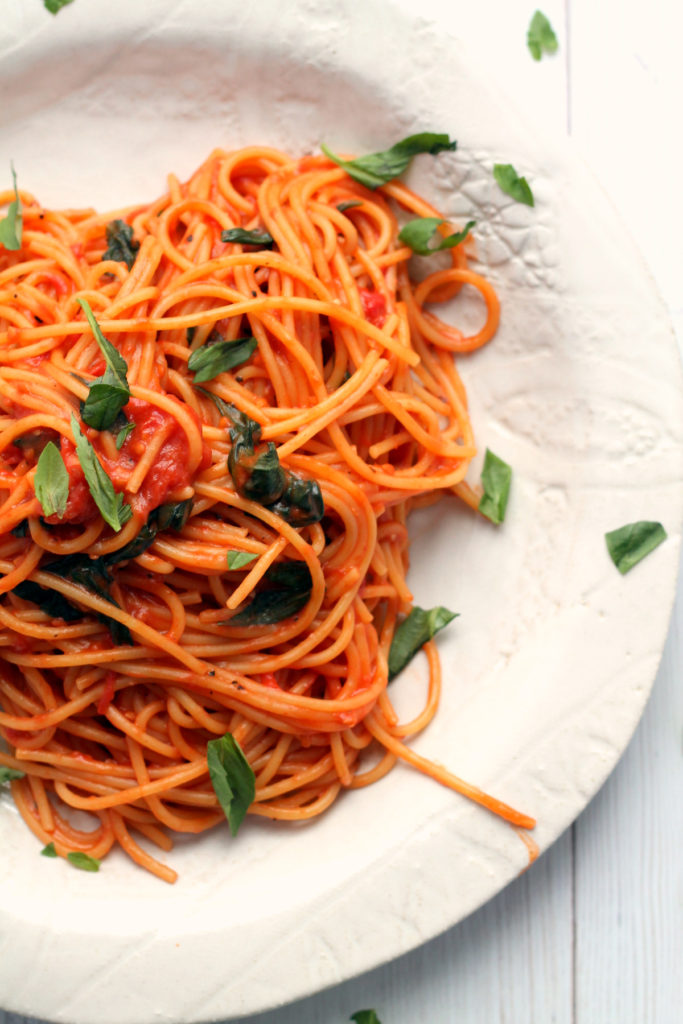 This one pot spaghetti requires only five ingredients and 15 minutes of your time! It is intensely flavorful and tastes just as good as a sauce that's simmered on the stove for an hour.