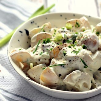 This greek yogurt potato salad is such a hit at BBQs! It's easy to make and the silky greek yogurt packs a real punch. I also love to serve this potato salad still warm!