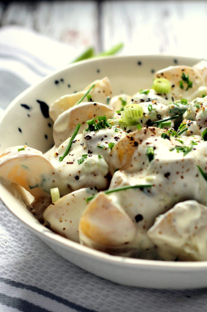 This healthy greek yogurt potato salad is such a hit at BBQs! It's easy to make and the silky greek yogurt sauce packs a real punch while being a lighter alternative to mayo. I also love to serve this still warm.