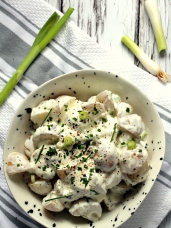 This greek yogurt potato salad is such a hit at BBQs! It's easy to make and the silky greek yogurt packs a real punch. I also love to serve this potato salad still warm!