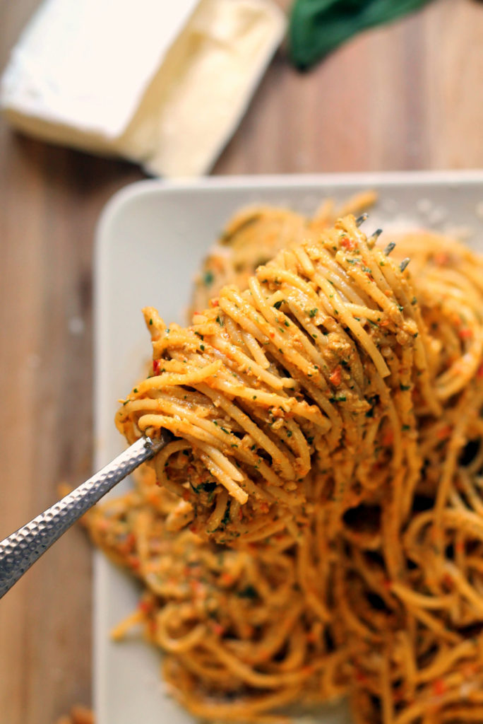 An easy homemade red pepper pesto recipe, with a little something extra! The addition of brie makes this sauce super creamy. Simply stir into cooked pasta, or it would make a great base for a gooey, hearty pasta bake. Scrumptious!