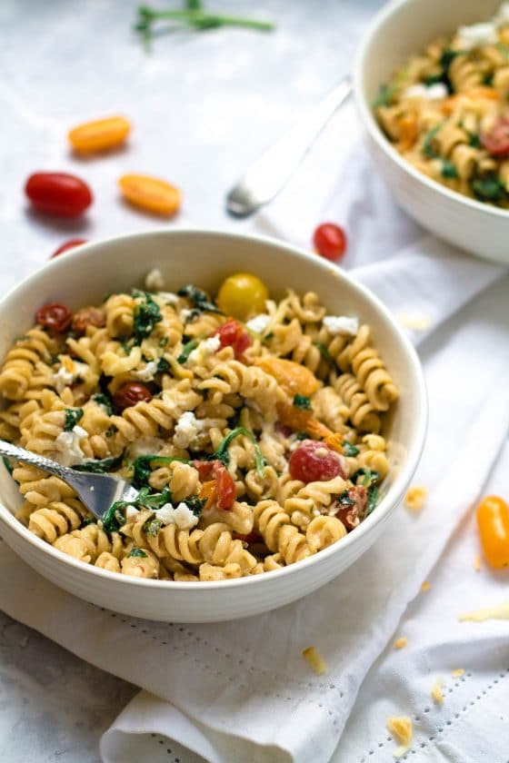 Image showcasing Goats Cheese, Cherry Tomato & Spinach Pasta - Happy Veggie Kitchen