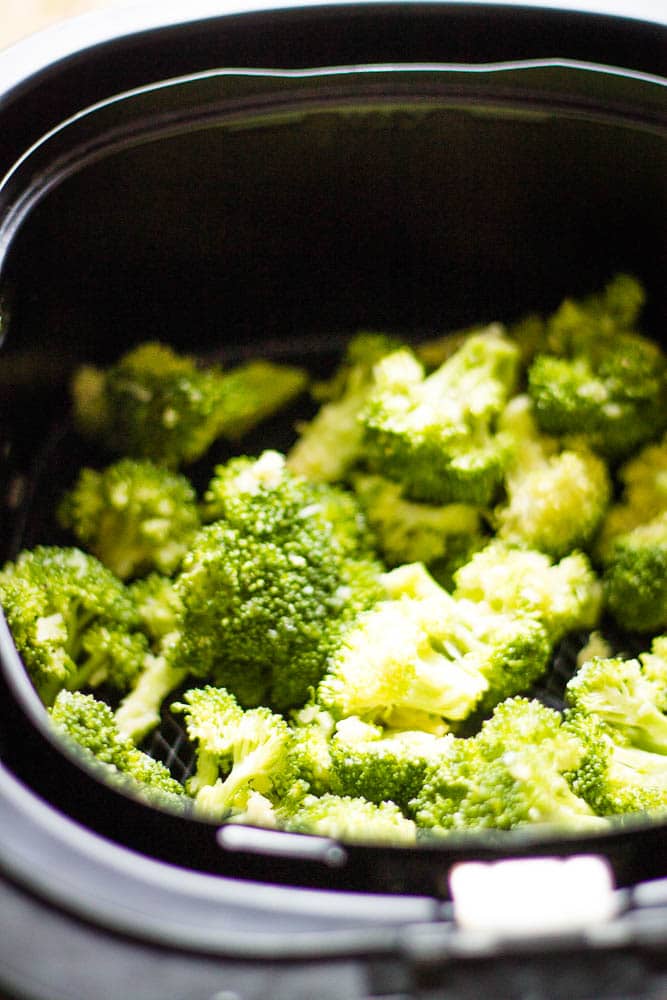 Raw broccoli in an air fryer