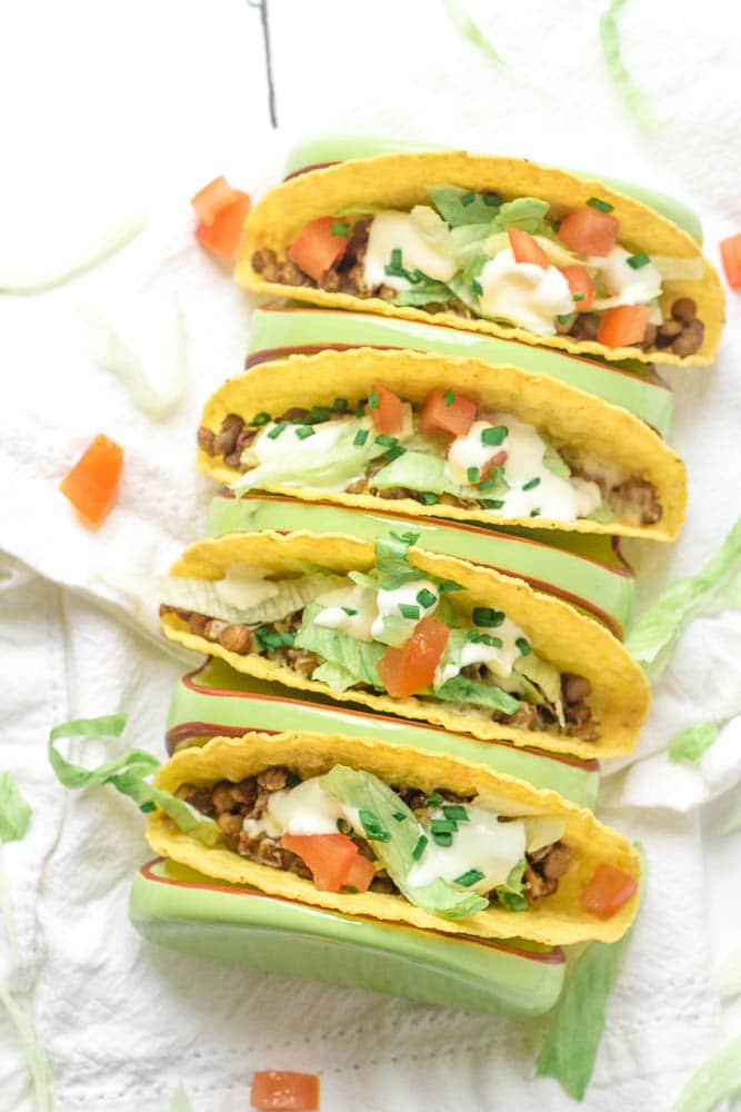 Air fried lentil tacos with toppings.