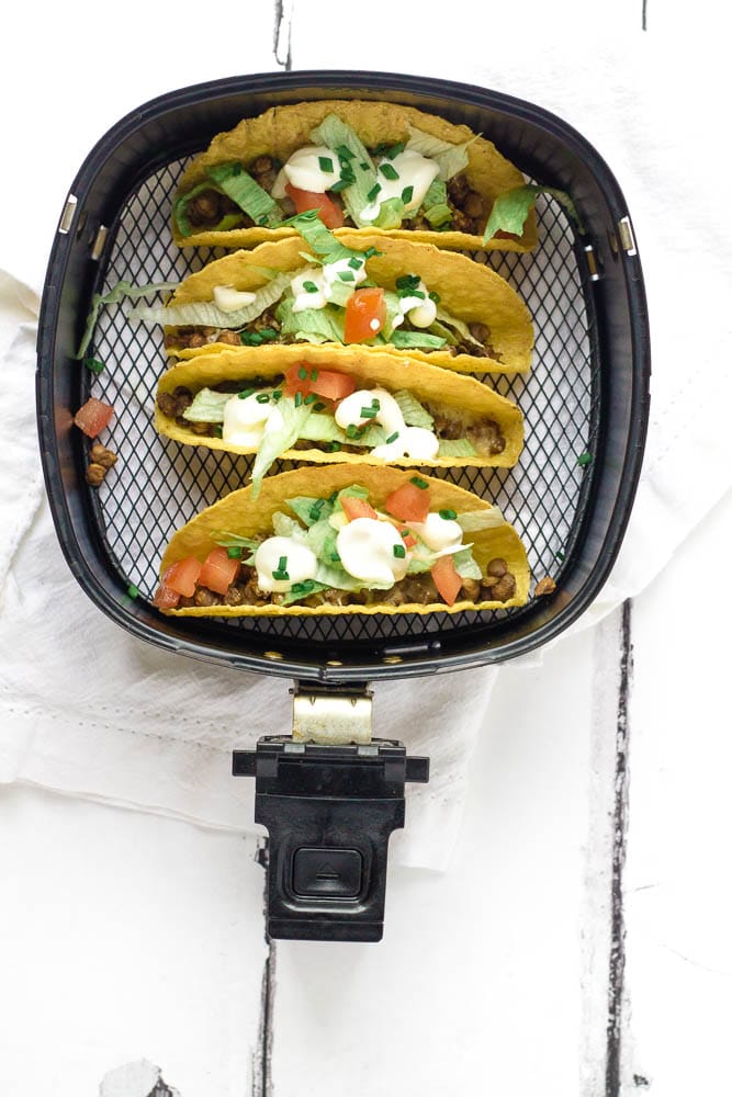 Air fried tacos with a variety of toppings.