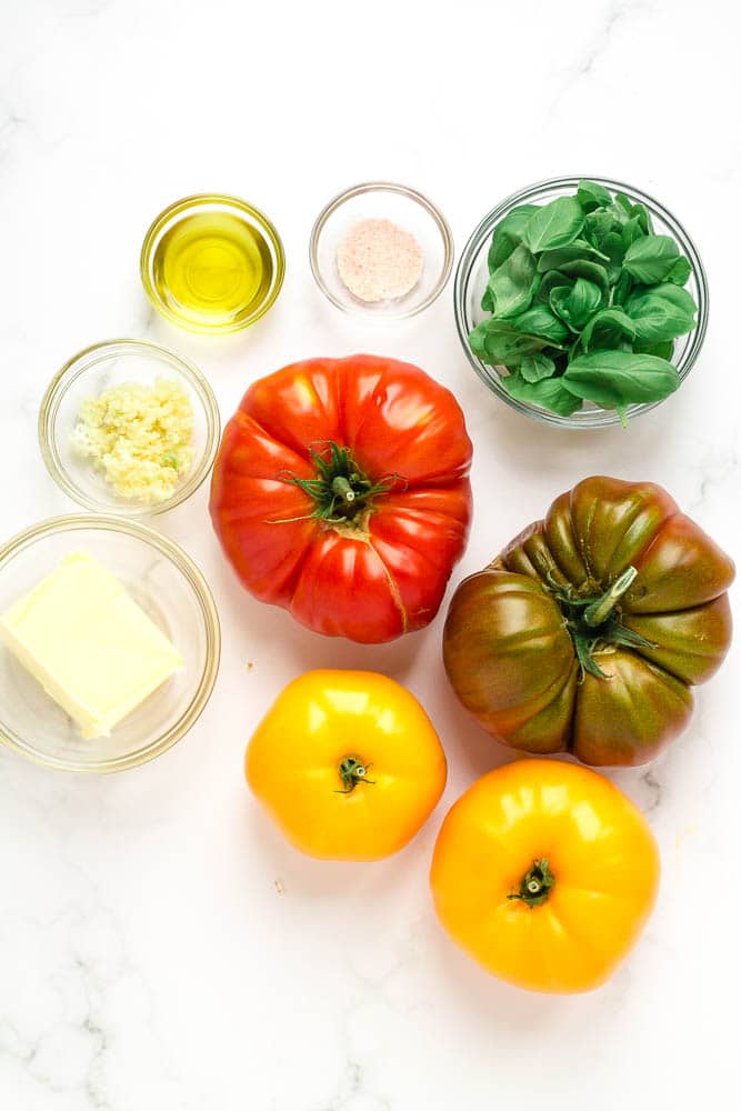 Ingredients to make heirloom tomato sauce