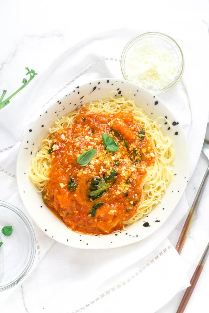 A bowl of heirloom tomato sauce on pasta