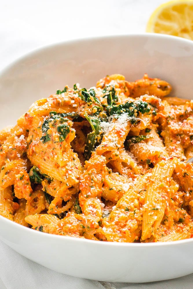 Close up of red pepper pesto pasta